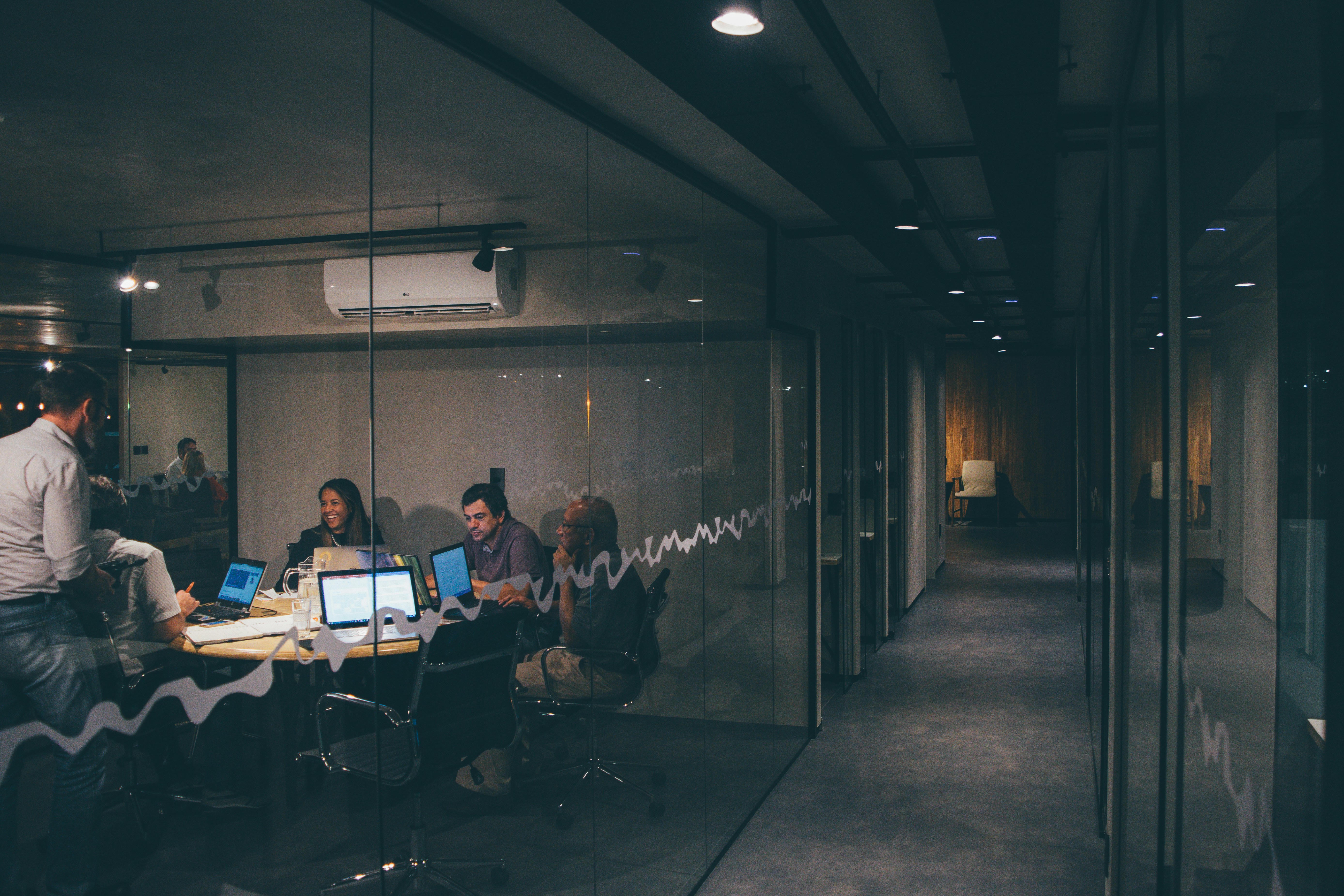 An operating team at work inside a business &mdash; William & Co builds value from the inside, alongside the founder